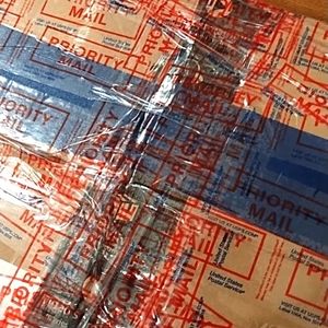 Mystery box of Fabric scraps and Notions for crafting